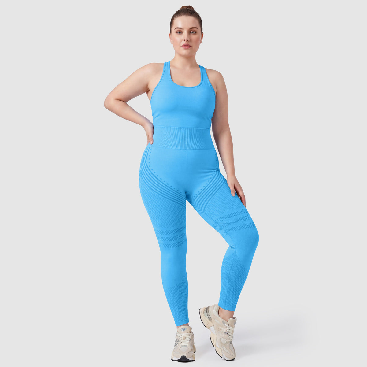 Mujer con leggings anticelulitis Sculpt 3D™ en turquesa, vista de frente, cintura alta